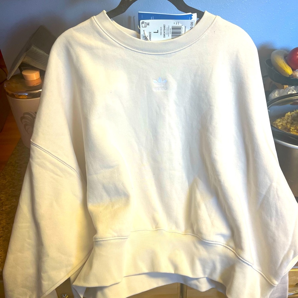 Brand new adidas sweatshirt. Loose and comfy fit